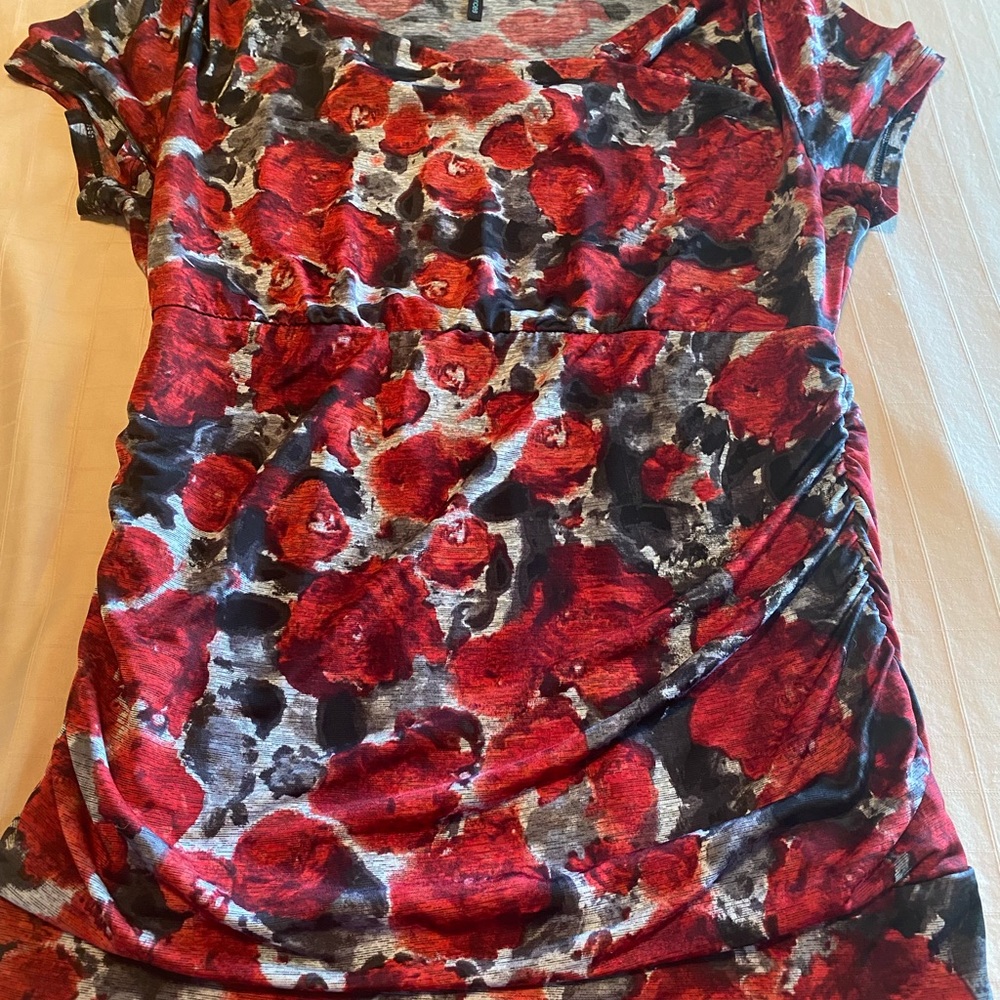 Woman’s half sleeve printed top gathered sides